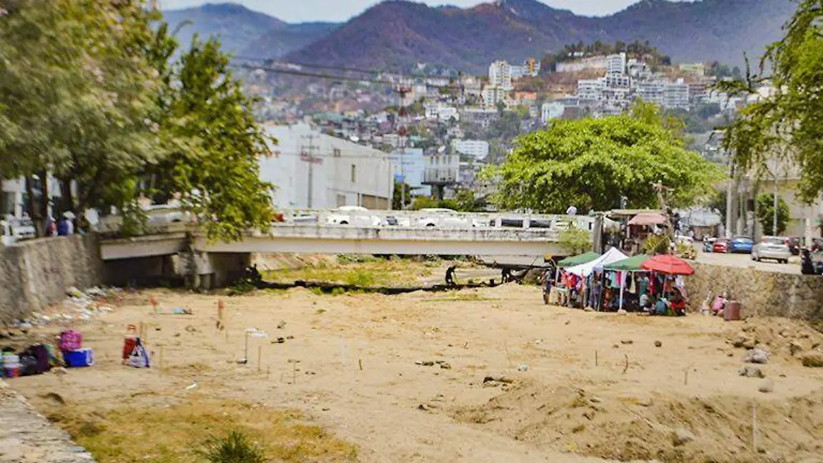 Comerciantes en el río Camarón